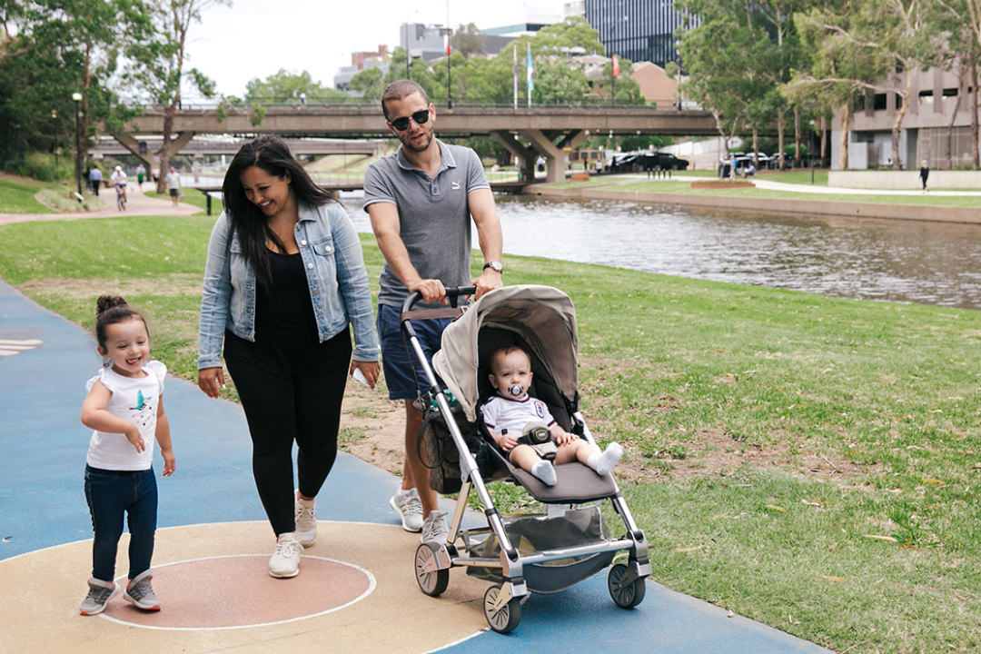 Family walking along Parramatta River