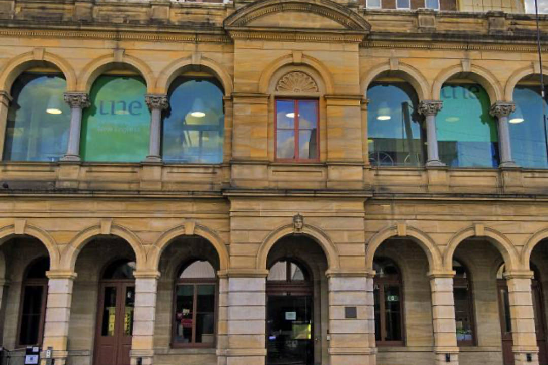 Image of the exterior of the heritage building on Church Street in Parramatta that is occupied by the University of New England