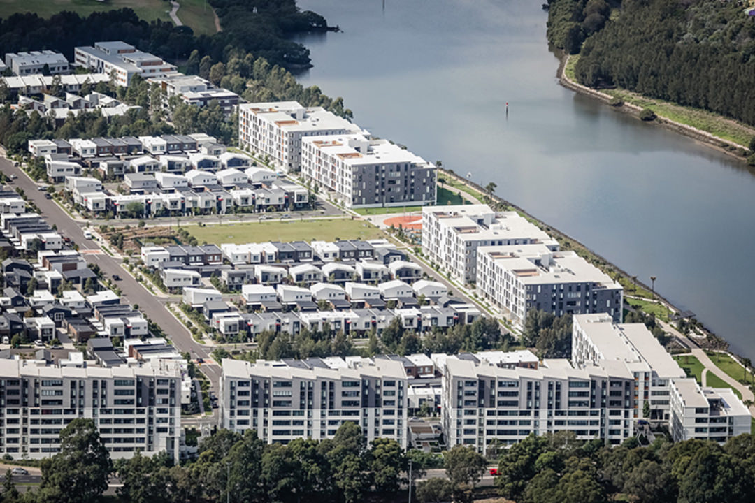 Rydalmere and Silverwater medium density residential riverside complex photographed from the air. 