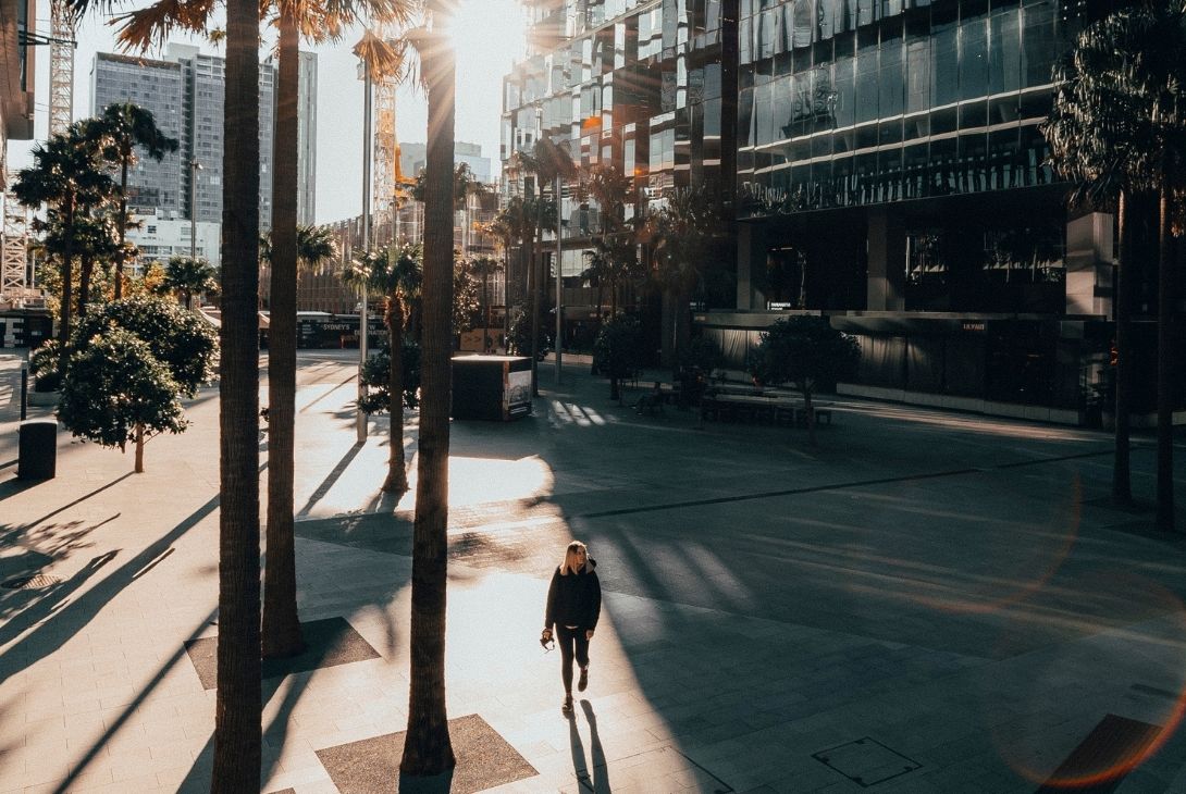 woman walking through parramatta square