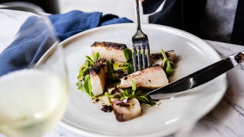 food on a plate with knife and fork