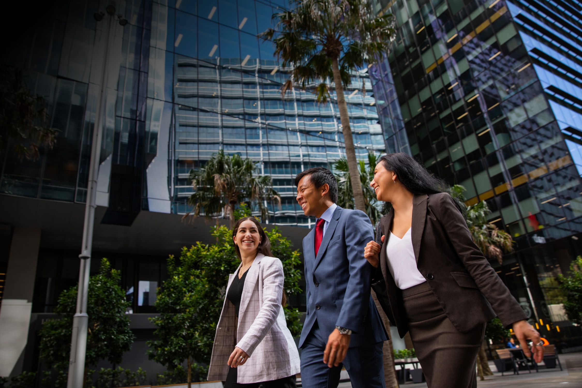 business people walking through parramatta square