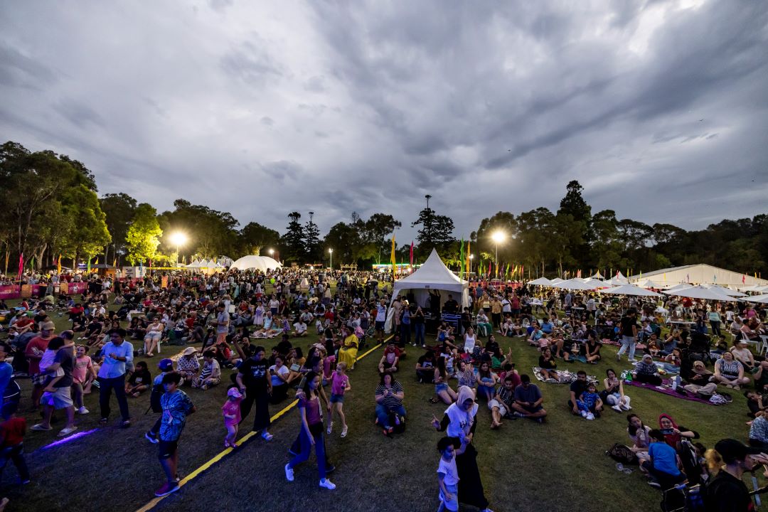 Group of people sitting at Parramatta Park