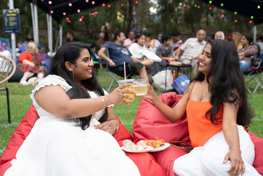 Two women sharing a drink