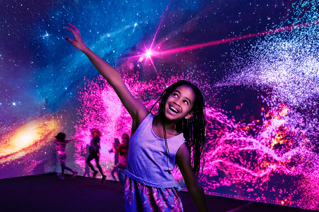 Young girl smiling with the background of space