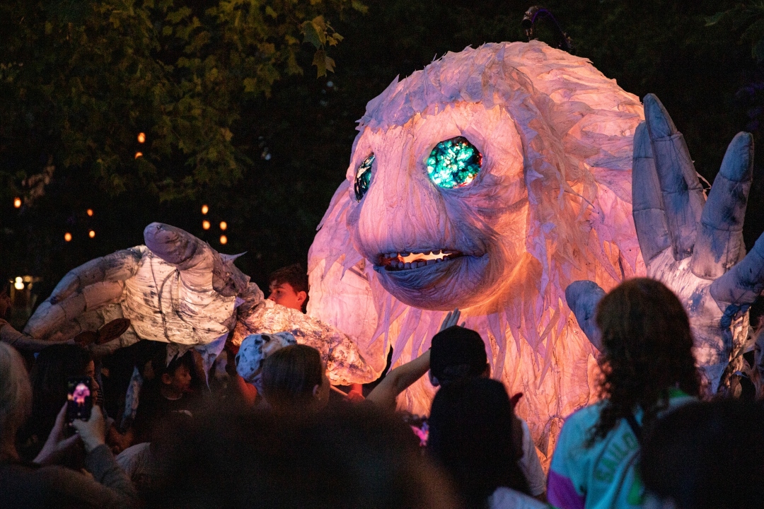 Glowing big magical winter puppet with blue eyes