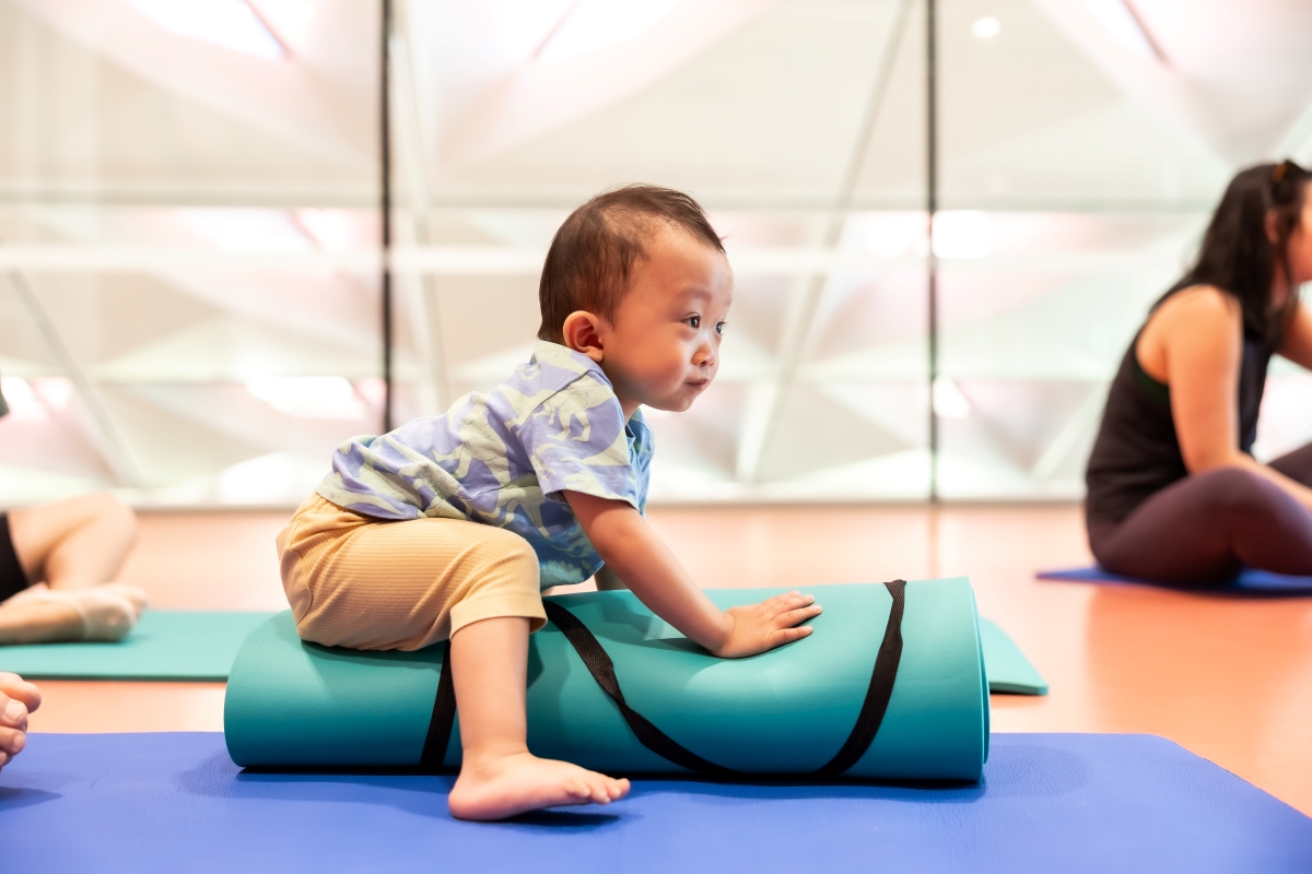 Baby boy doing yoga