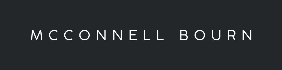 White, widely spaced uppercase text reading “MCCONNELL BOURN” centered on a dark charcoal background, creating a clean, minimalist logo.