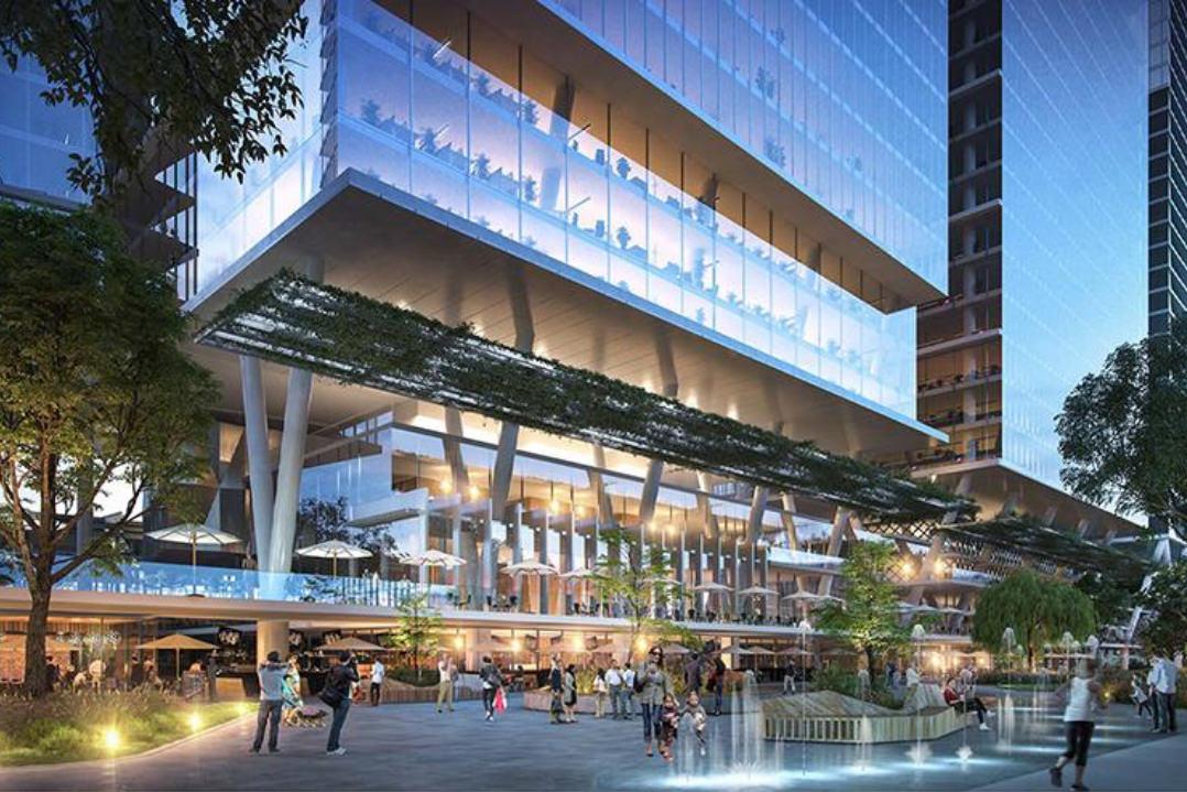 Architects rendering of 4 Parramatta Square, set to be home to 4000 government workers from multiple agencies. The building dominates the background and skyline. Its V-shaped podium pillars are an architectural marvel as residents and workers mingle amongst the shops and restaurants of the lower retail precint