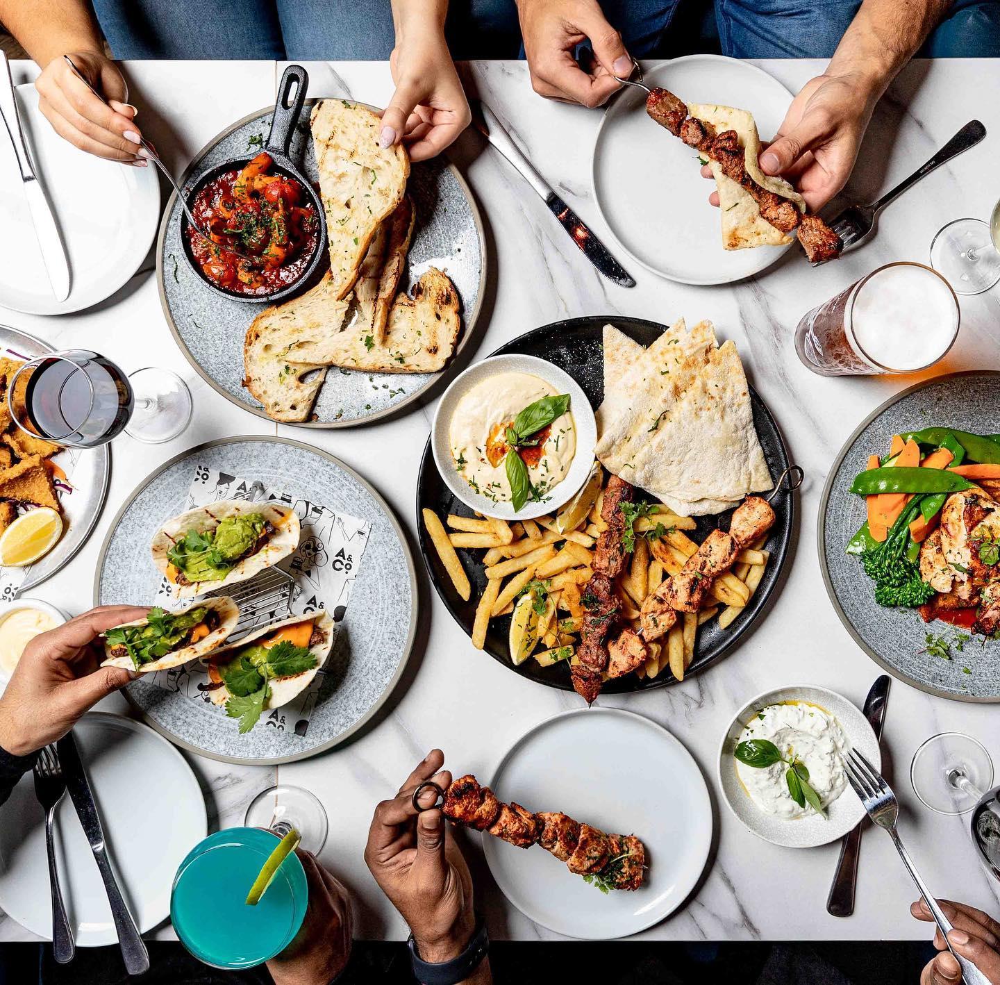 Shared table of food