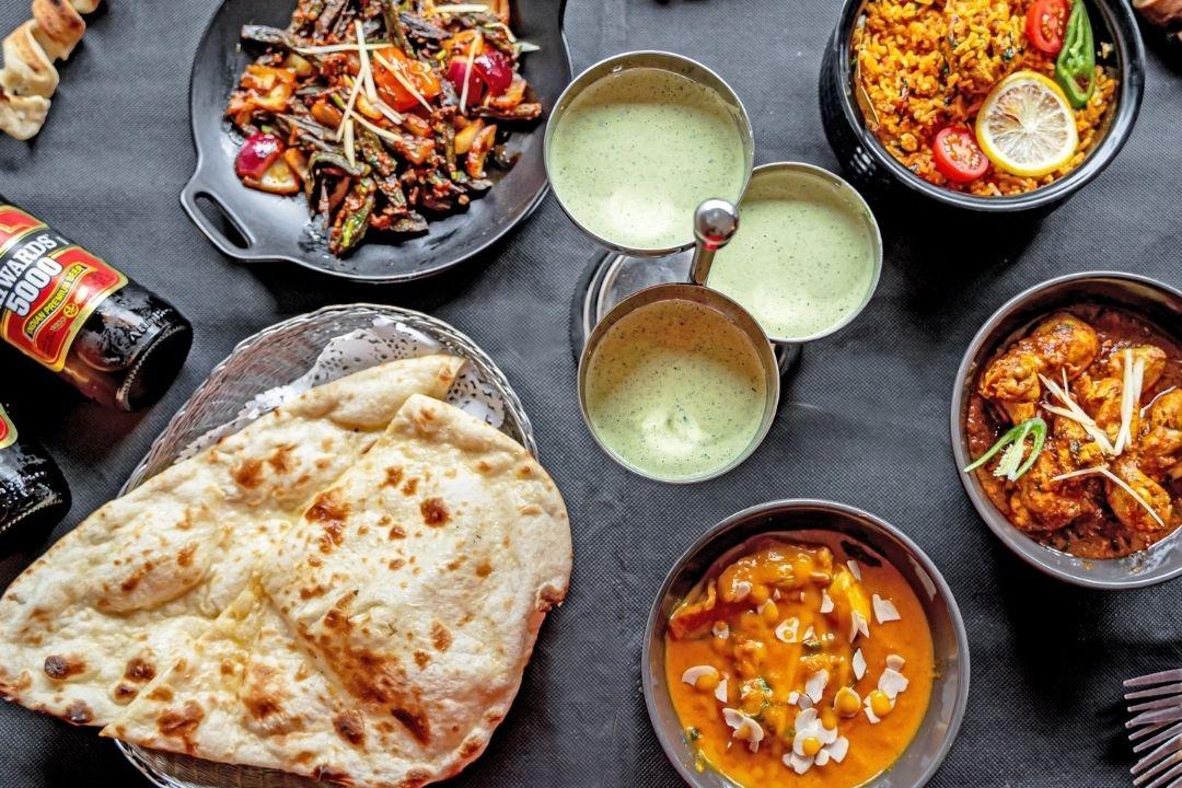 Indian share table naan and curries