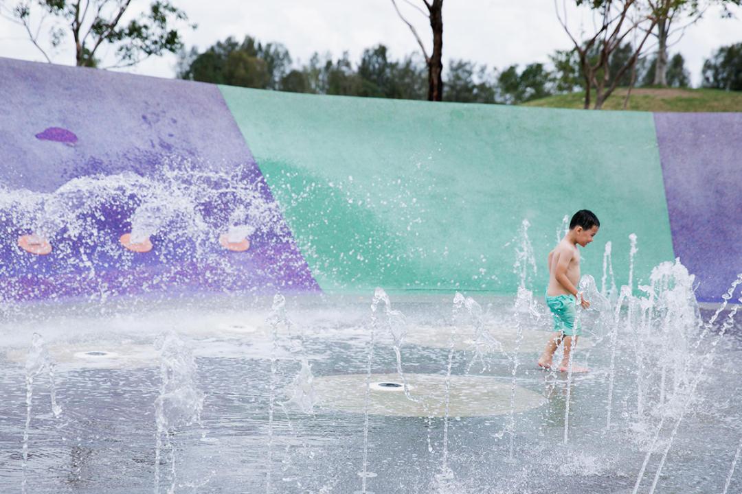 boy playing at Blaxland riverside park