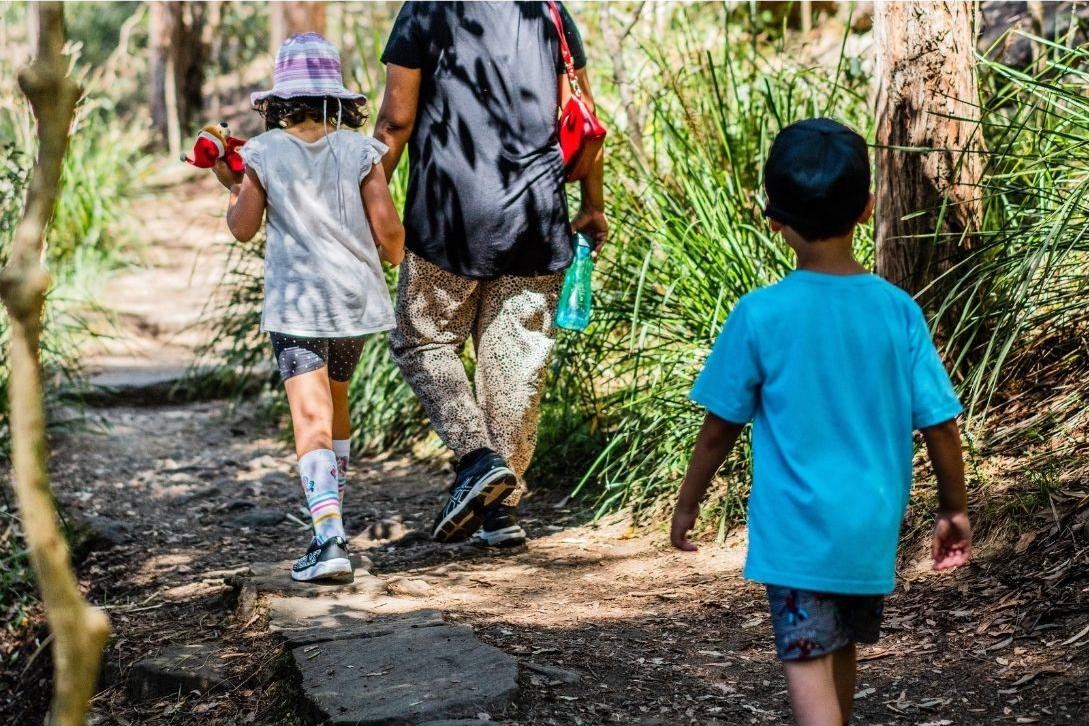 family bush walking at lake parramatta