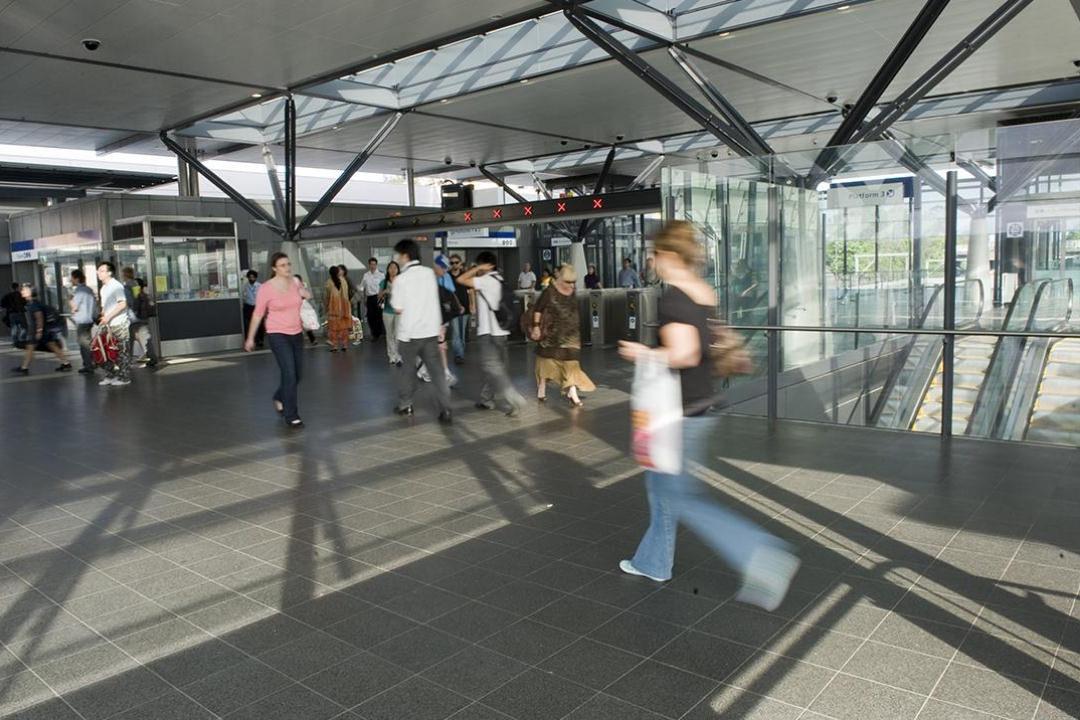 An image of Epping Station bustling with commuters moving through the morning rush hour.