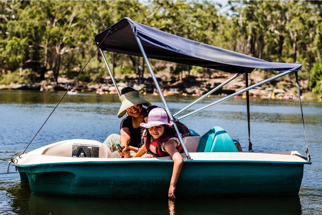 family in pedal boat