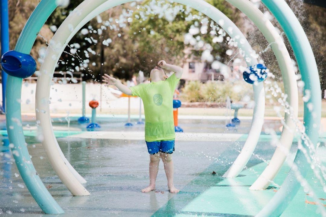 young boy at waterpark