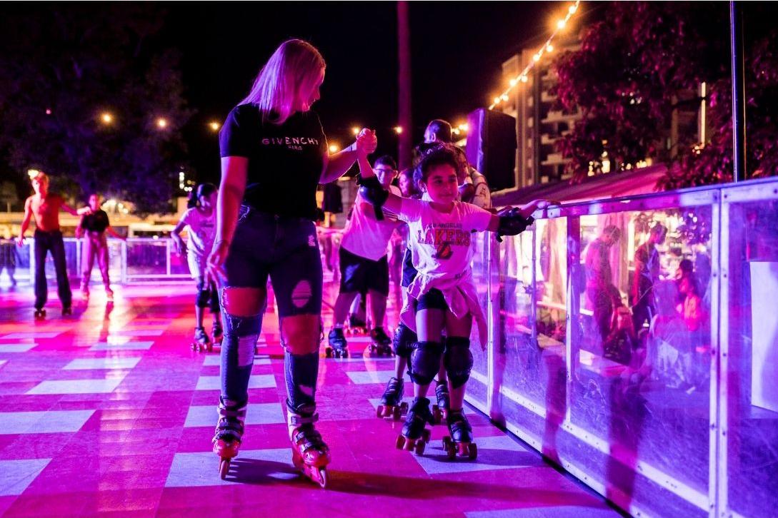 Mum and daughter roller skating