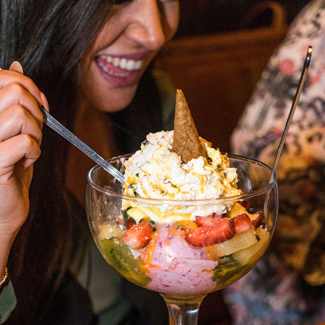 lady with large ice cream in glass