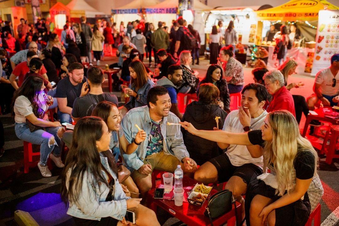 Groups of people eating at parramatta lanes event