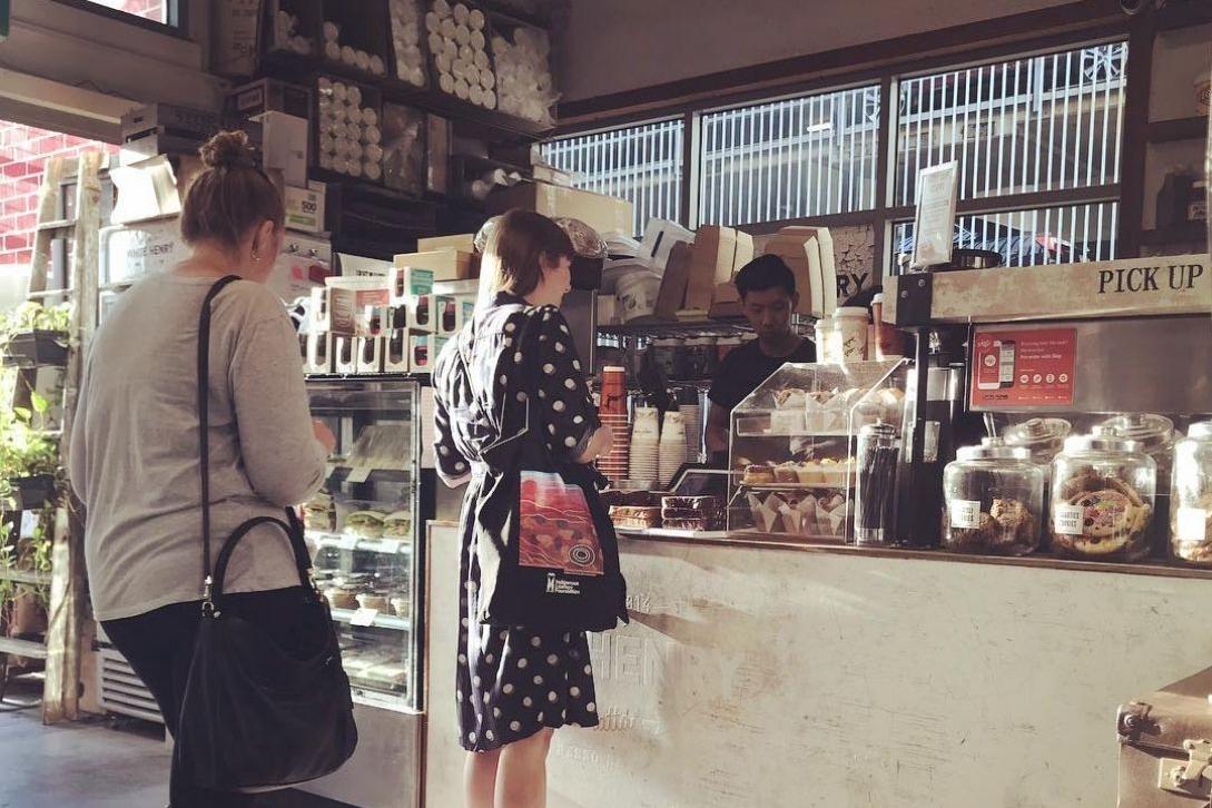 people queueing up for coffee