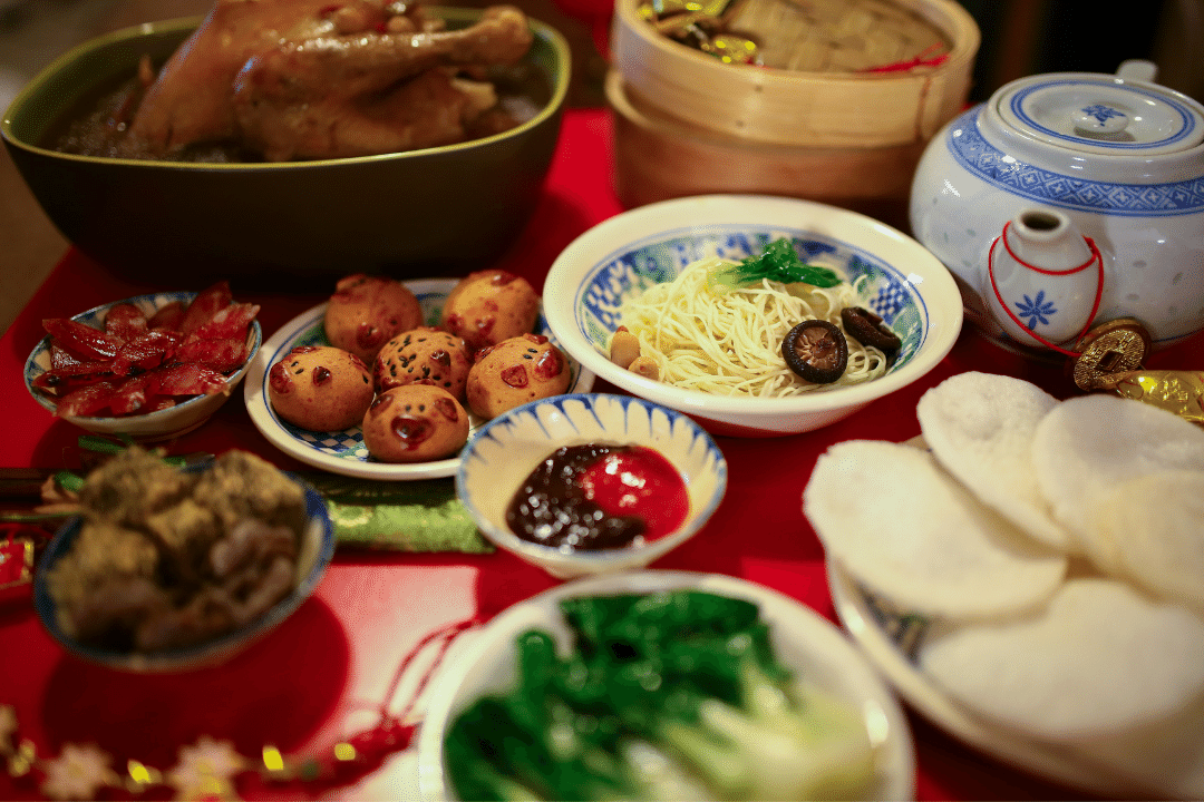 A delicious Lunar New Year feast set on a table.