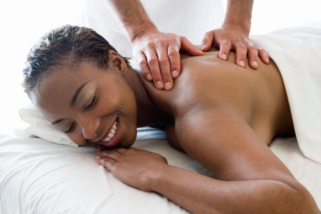 woman enjoying a back massage