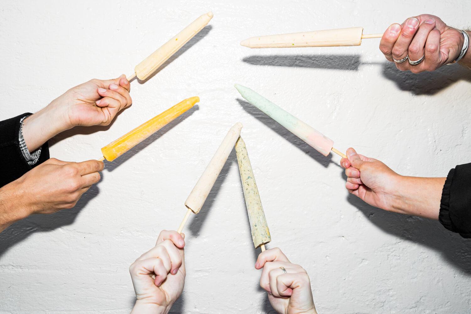 Hands holding ice blocks