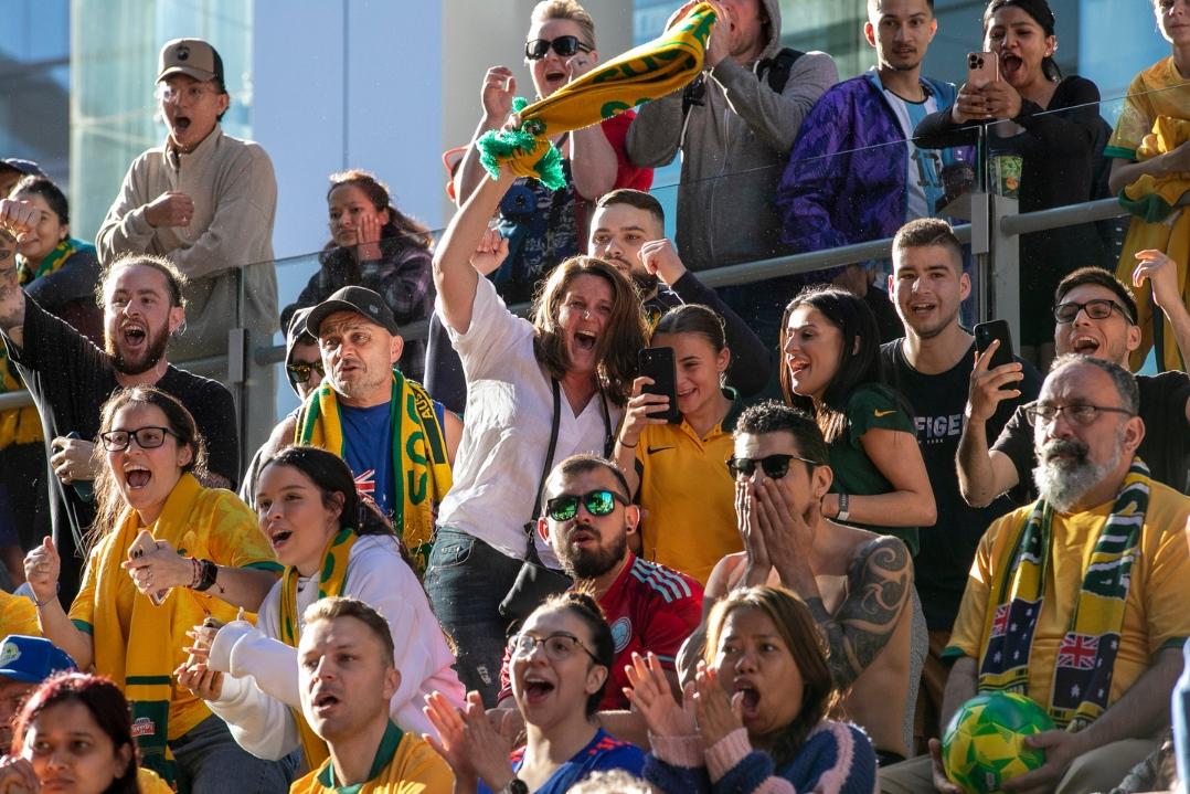 People cheering at a live site