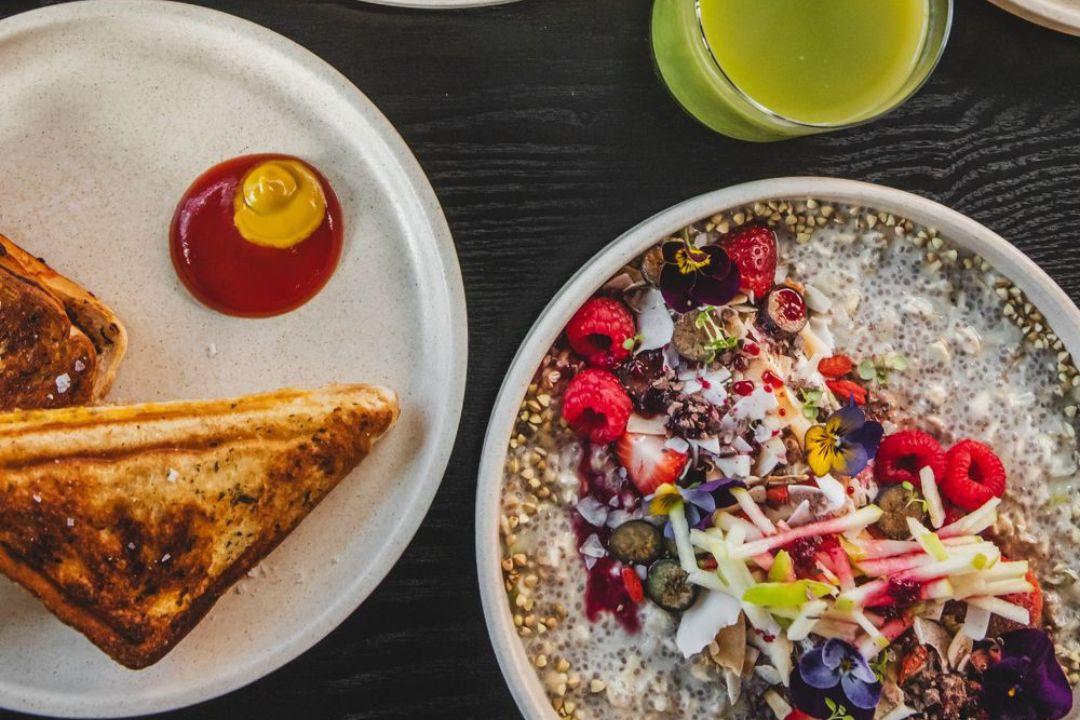 Flat lay of toastie and chia seeding pudidng