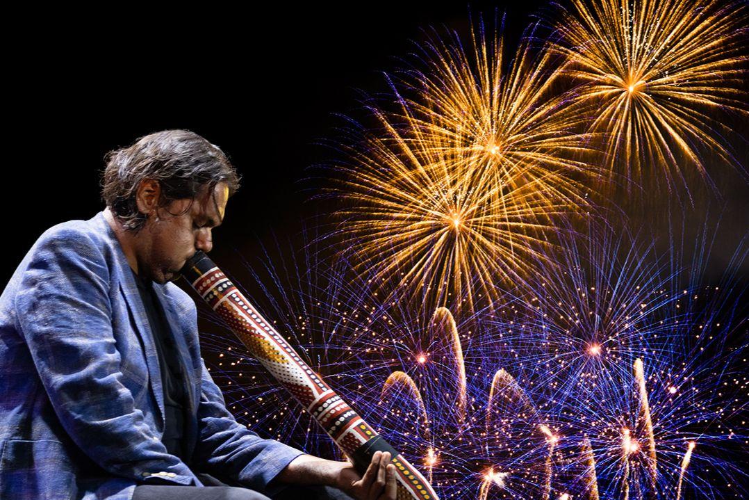 Musician under fireworks