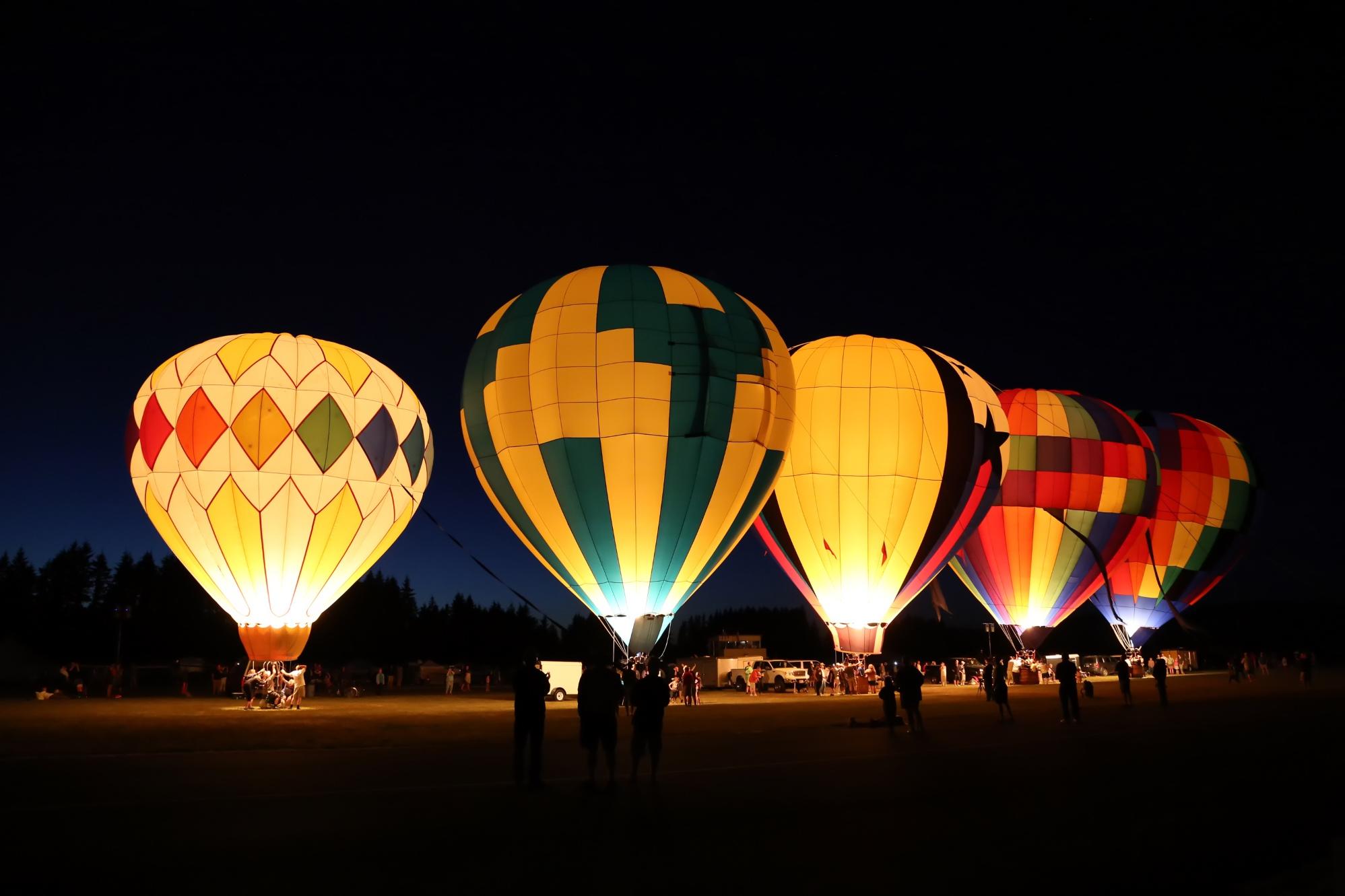 hot air balloons at night