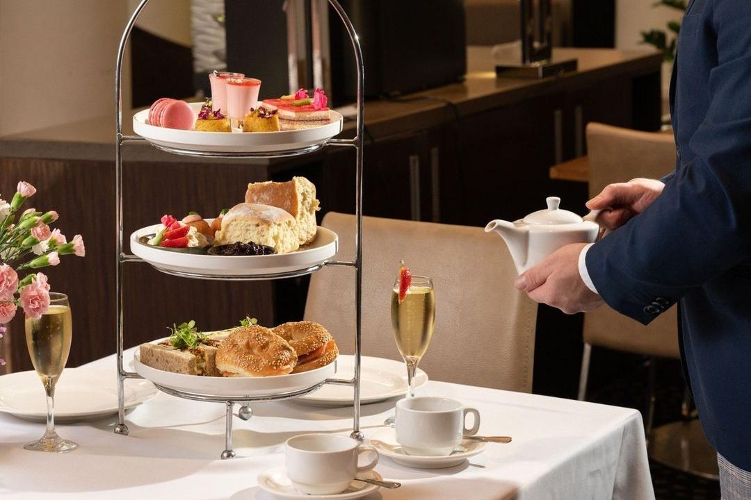 High tea and champagne on a table