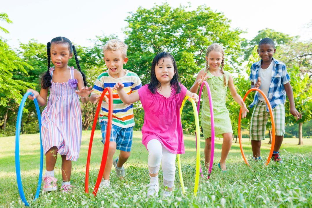 Children playing with hula hoops