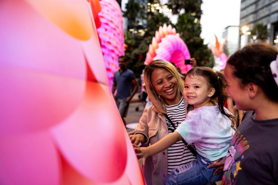 Woman and child with giant balloon