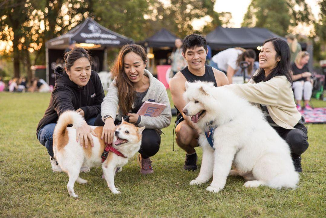People with dog in park