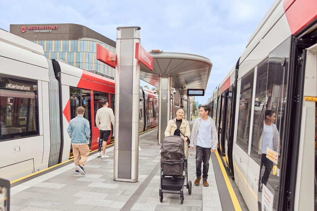 People getting off the Parramatta Light Rail