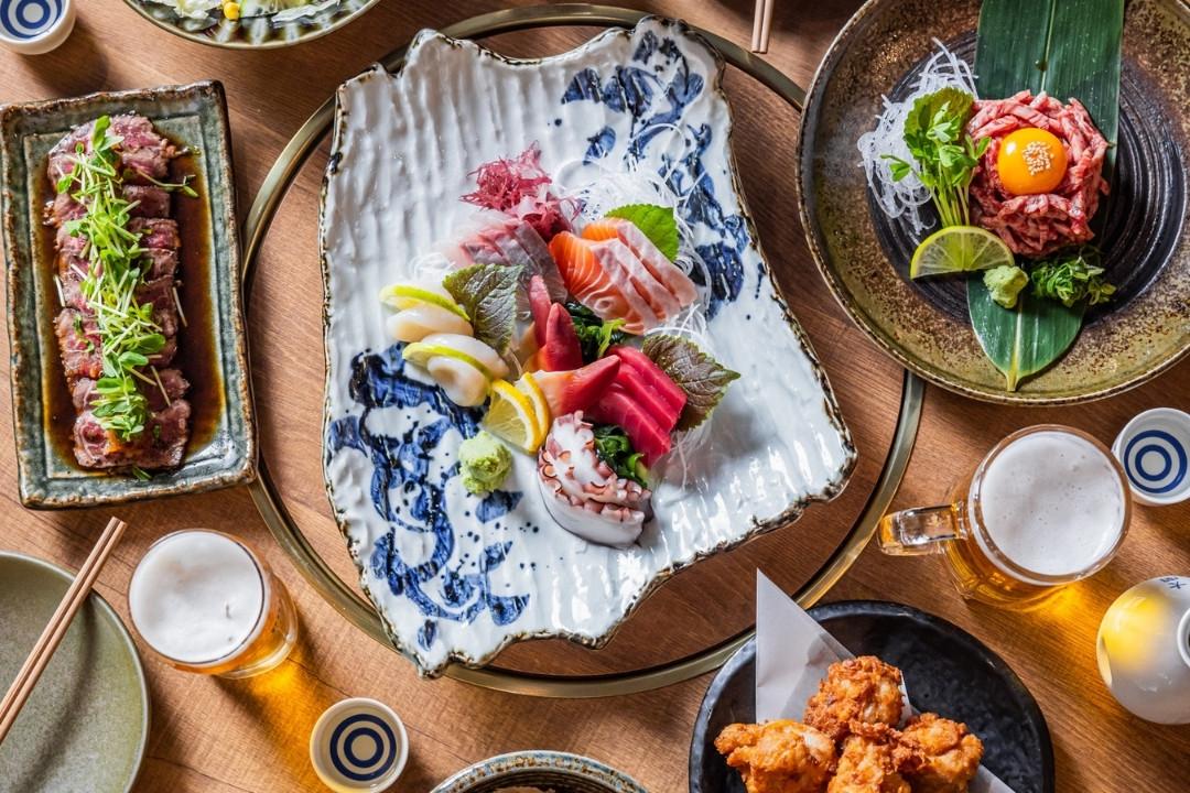 Plate of sashimi, Japanese beef and fried chicken