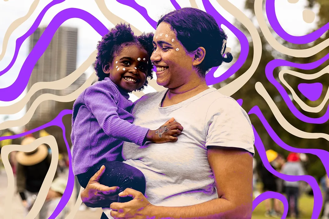 A woman joyfully holds a smiling child outdoors, both wearing casual clothes. Abstract purple and white swirls in the background add a whimsical touch.