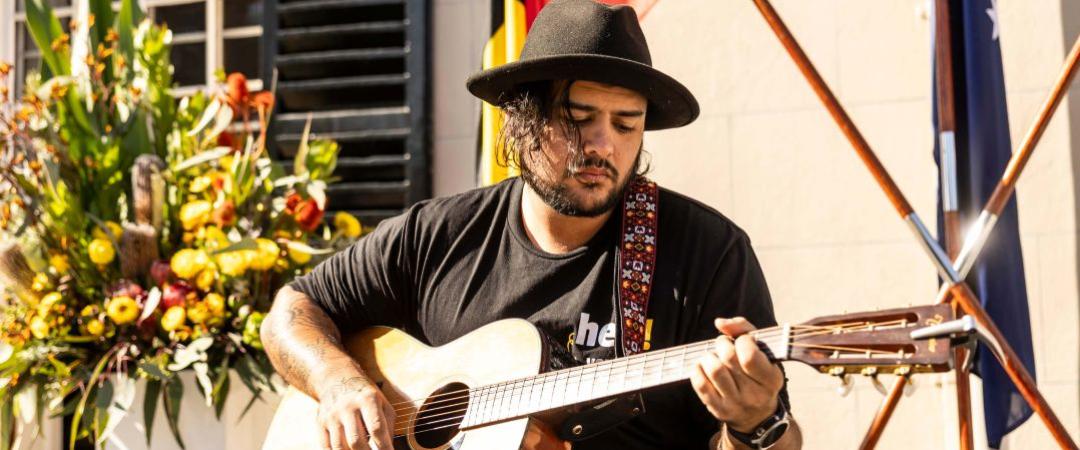 man playing guitar