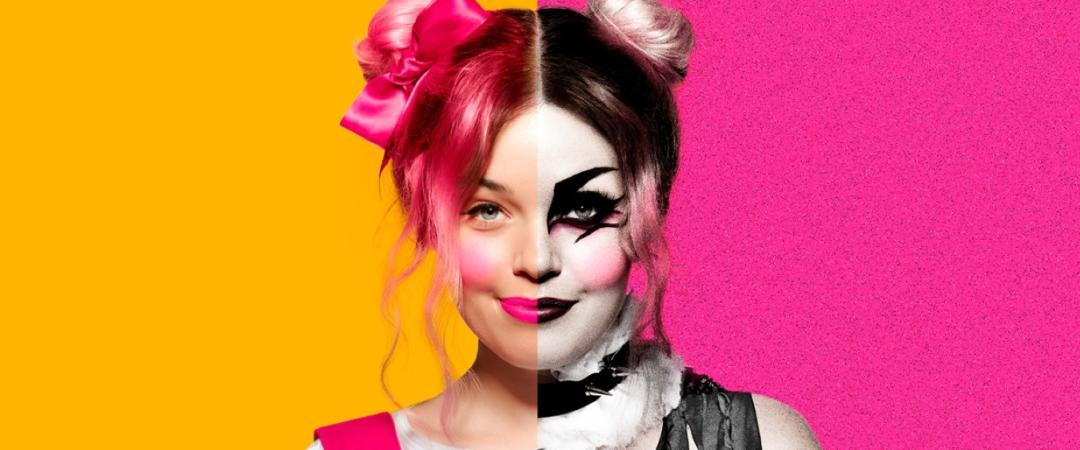 Head shot on a pink and yellow background
