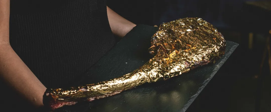 Gold covered steak