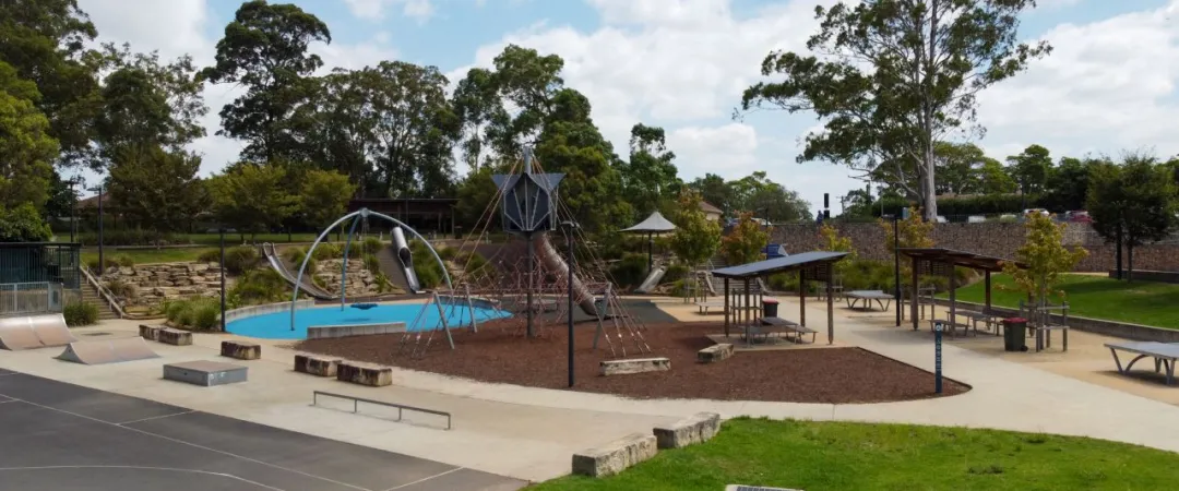 Playground with court and grass area