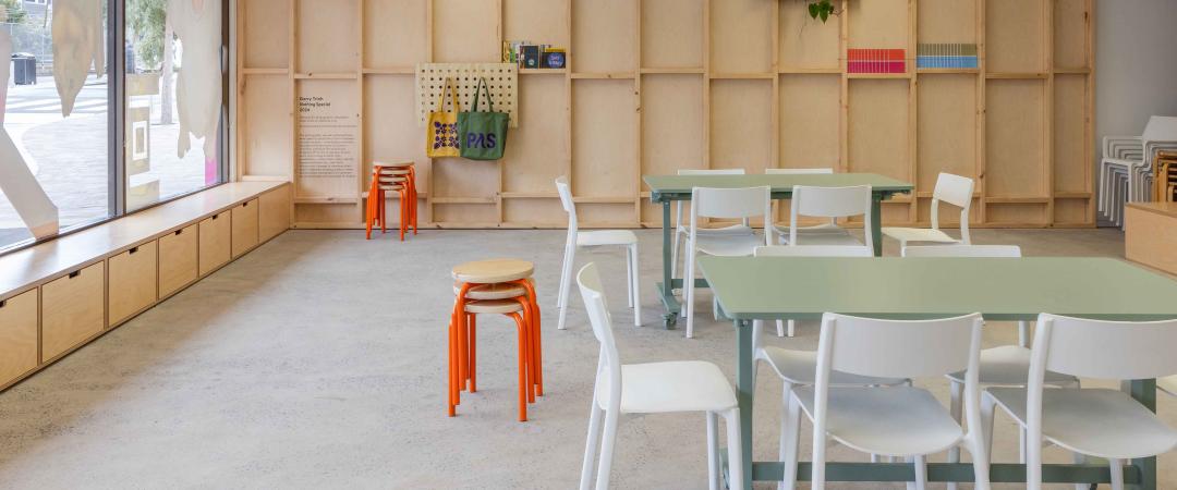 A bright room filled with tables and chairs