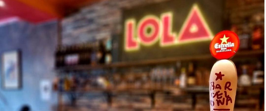 Beer tap and Lola signage