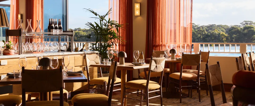 Indoor dining overlooking waves