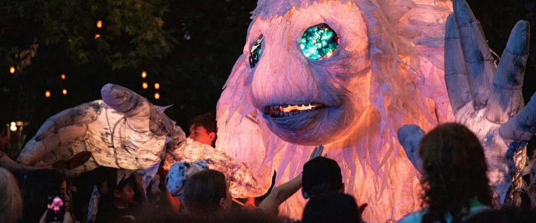 Glowing big magical winter puppet with blue eyes
