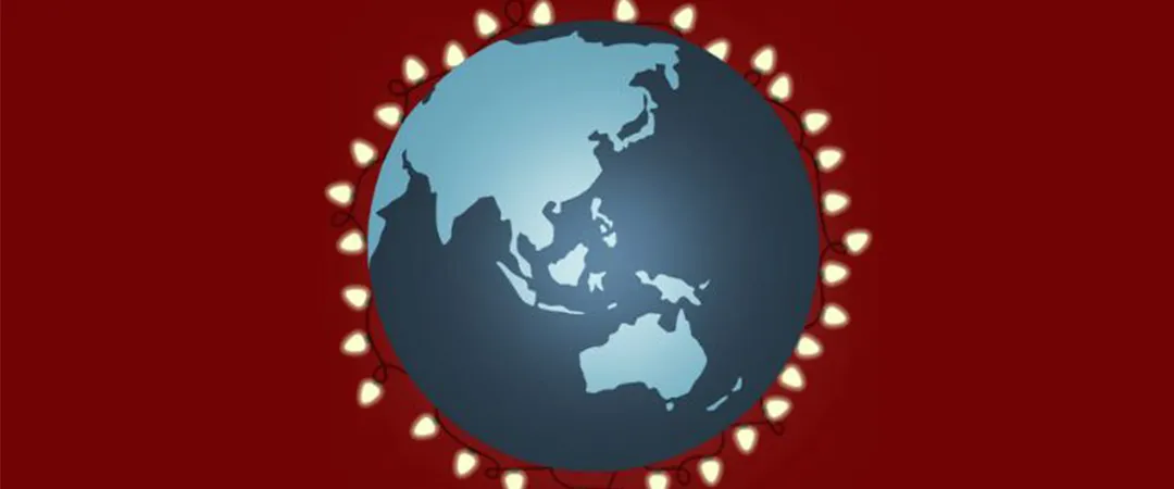 Stylized blue globe showing Asia and Australia, encircled by glowing lights on a deep red background, creating a festive, global mood.