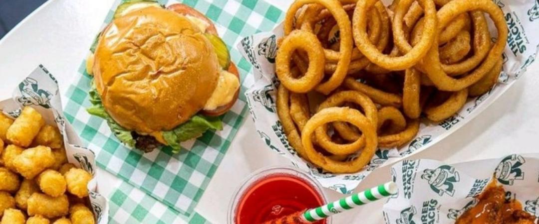 Burger, onion rings and drink