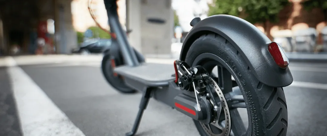 Scooter parked on road