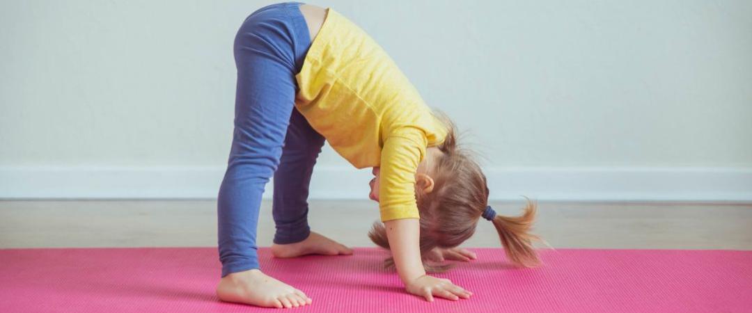 Toddler doing yoga